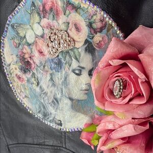 Black Leather Jacket with Floral Embellishments